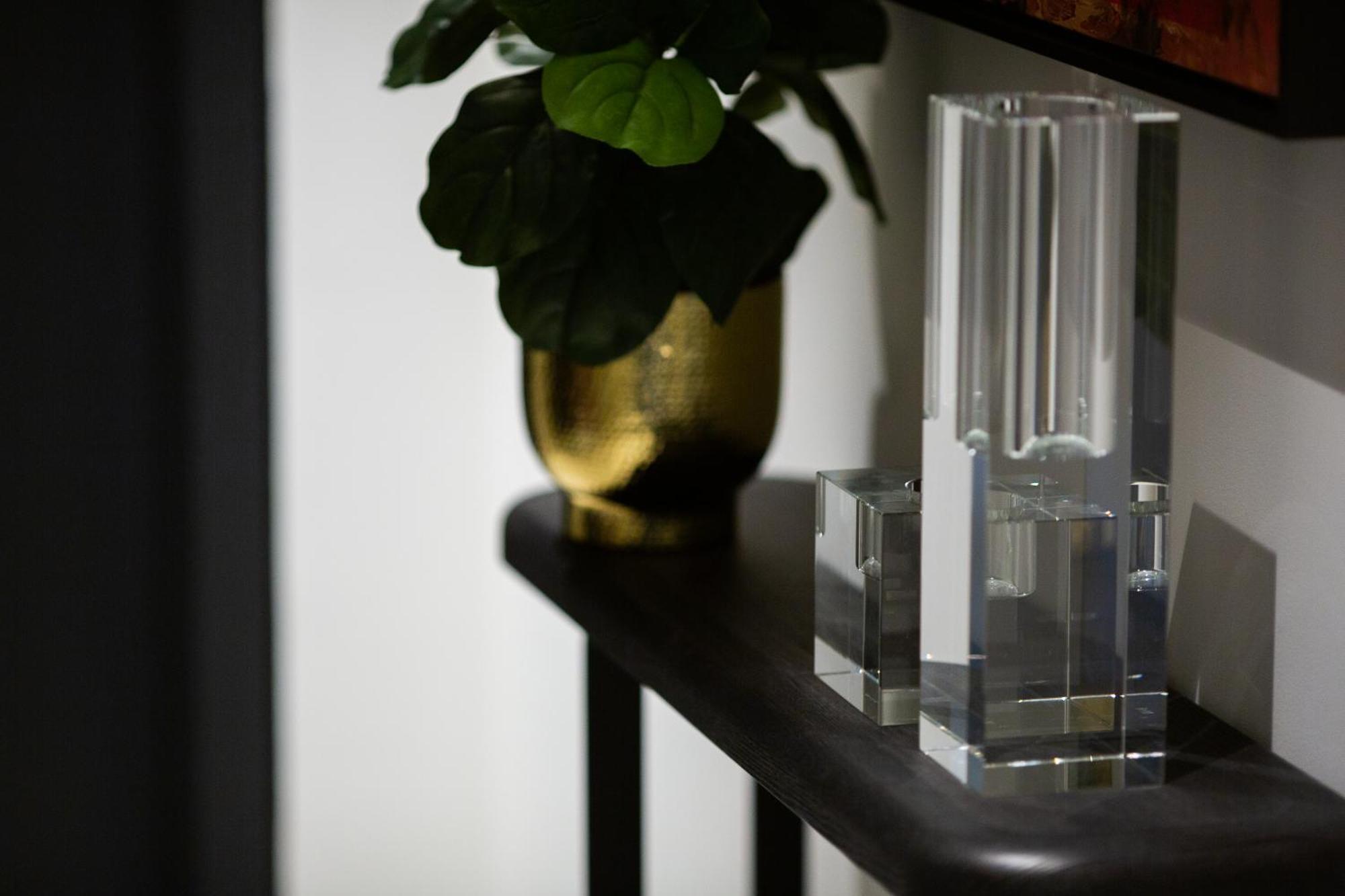 One Global Resorts Green Square Sydney Exterior photo A vase and candle holder