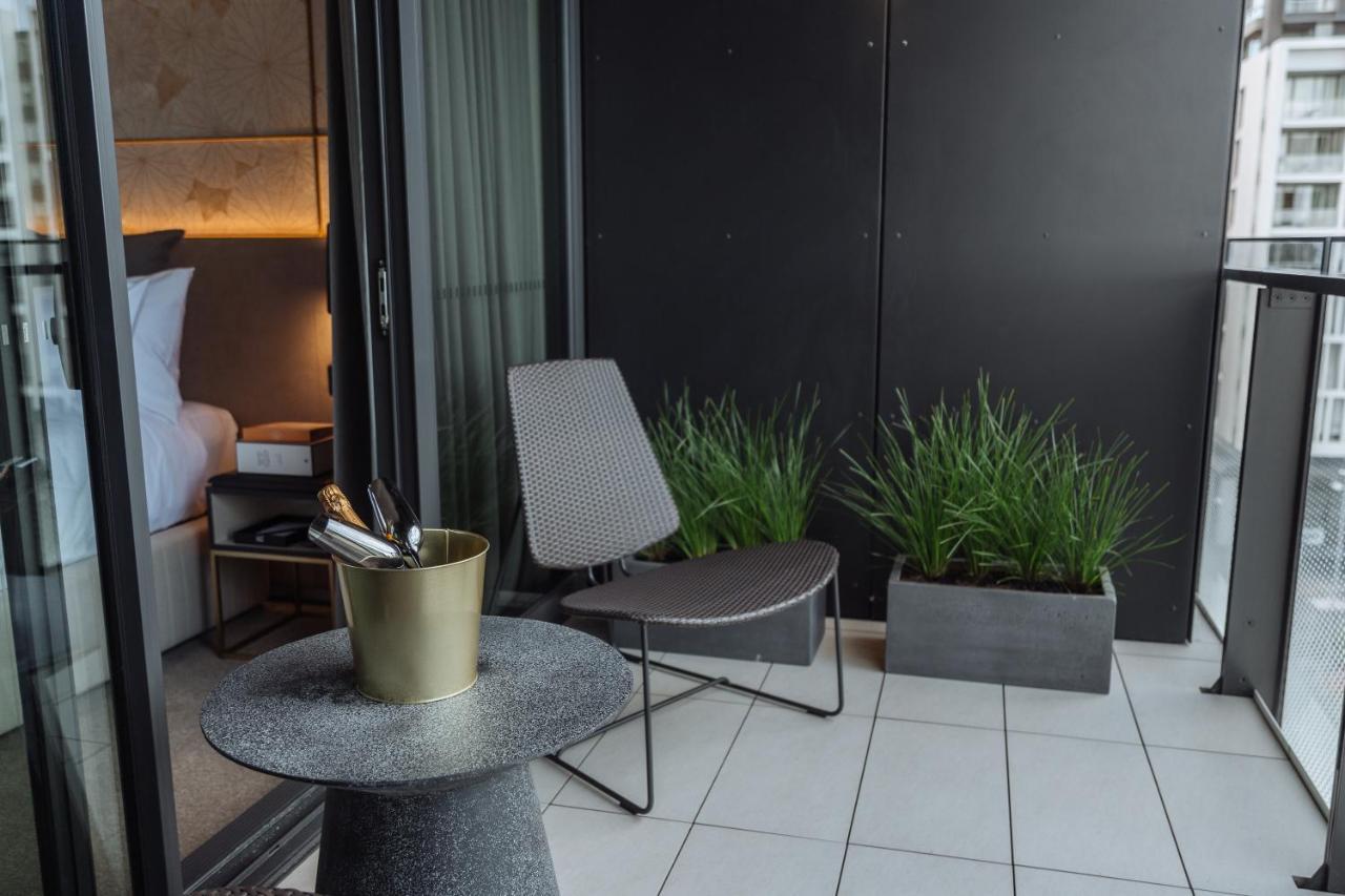 One Global Resorts Green Square Sydney Exterior photo A balcony in a hotel room