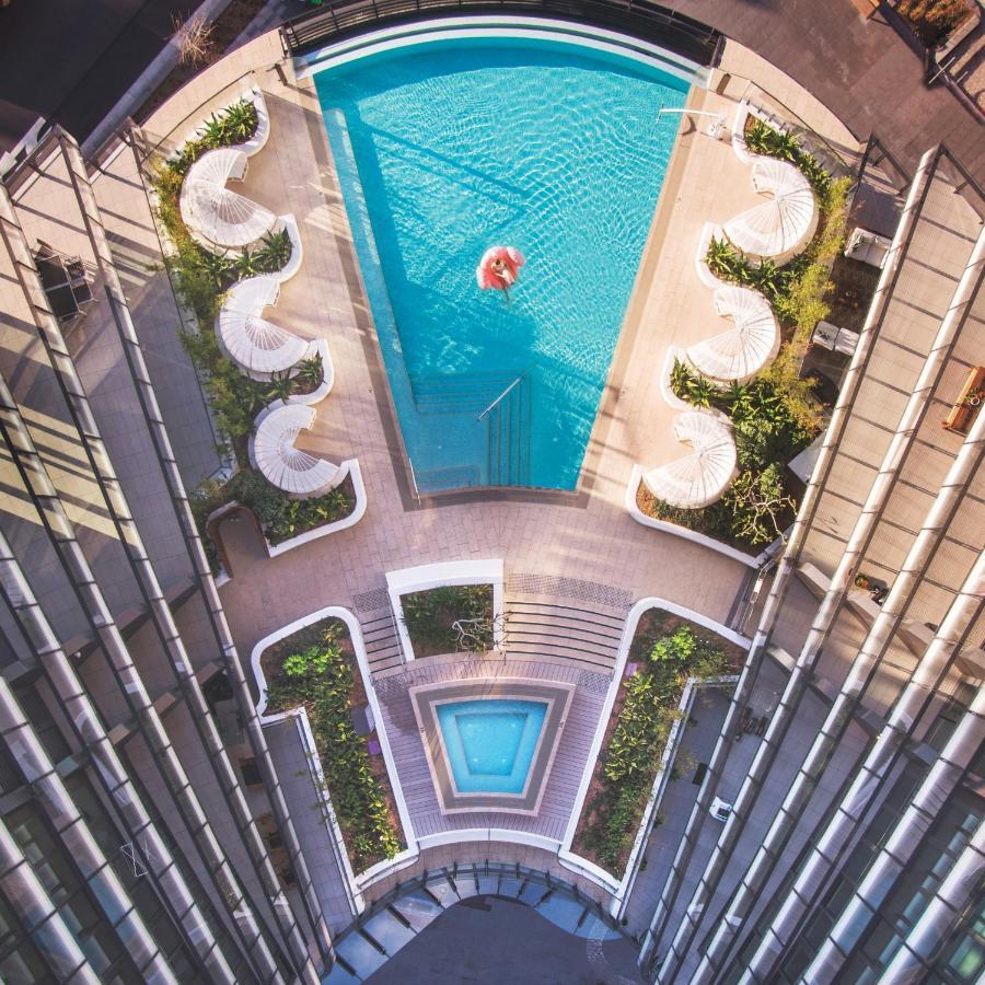 One Global Resorts Green Square Sydney Exterior photo The pool at the 1018